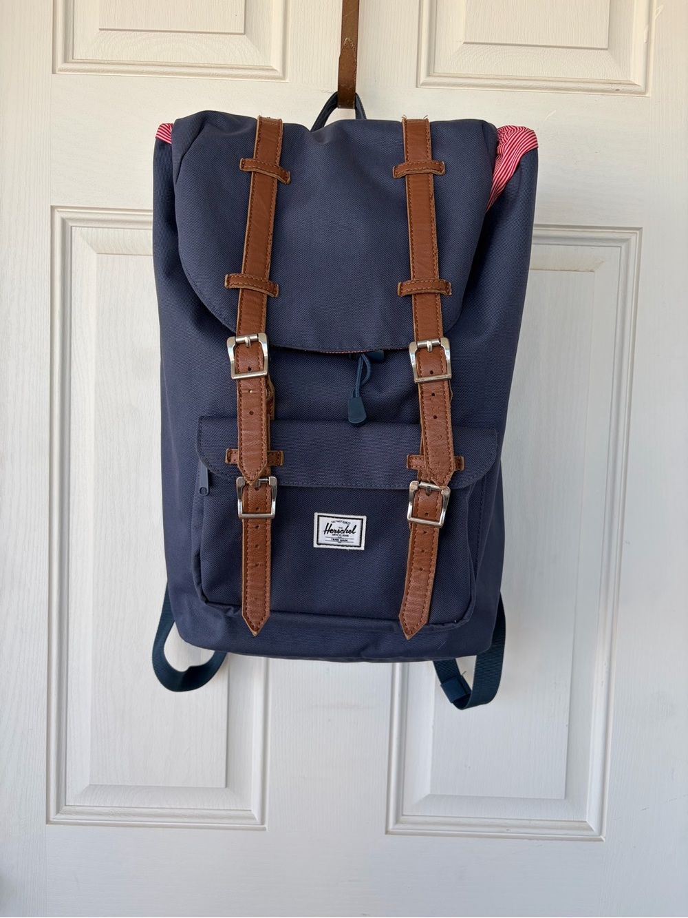 Herschel Supply Company Navy Backpack with Brown Leather Straps and Red Accent